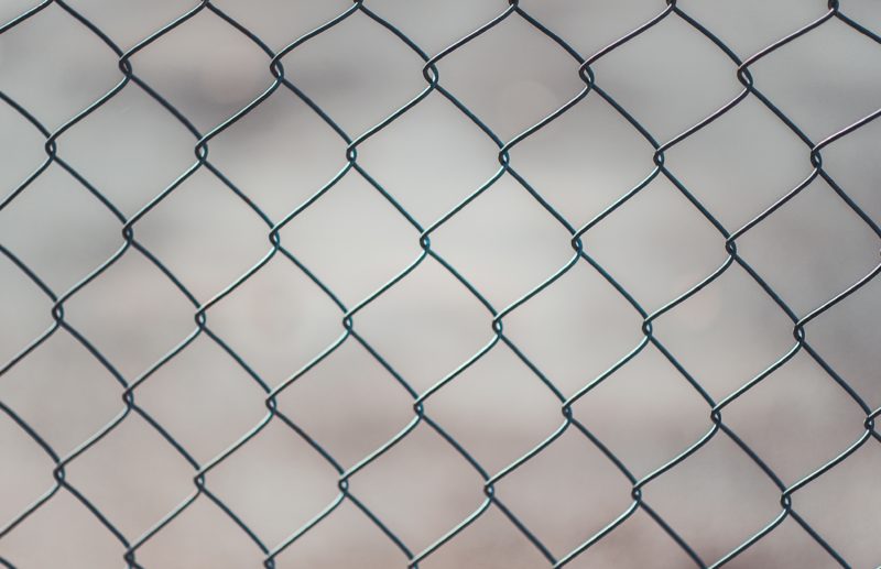 Close-up photo of a chain link fence