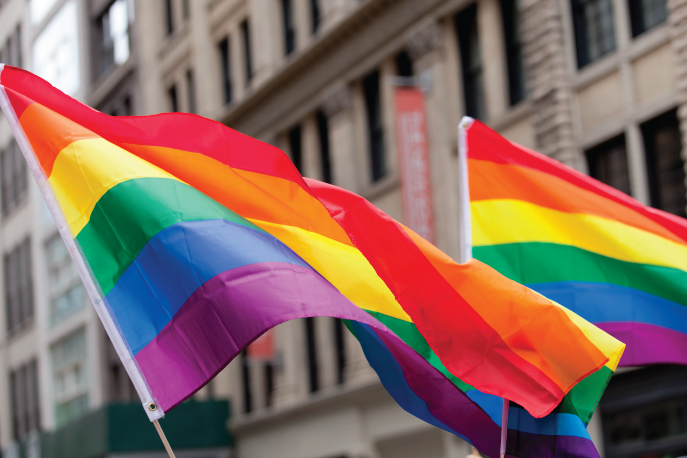 Two rainbow Pride flags