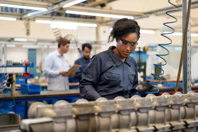 Black woman working in a factory