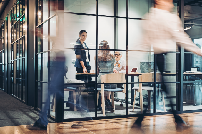 Employees in a board room