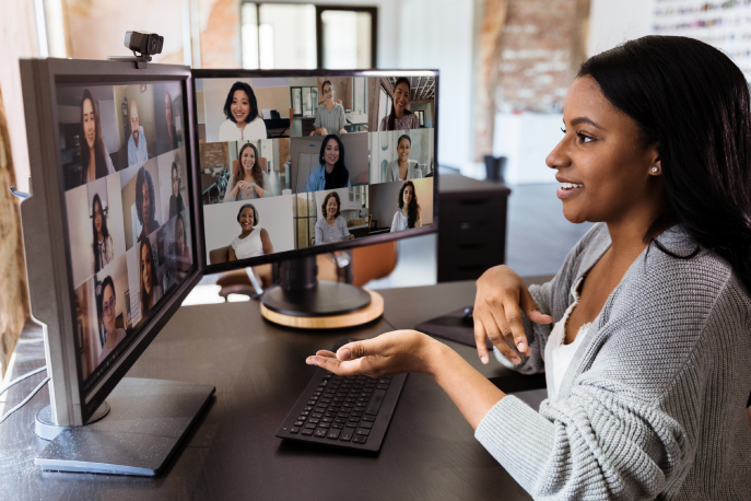Woman talking to her coworkers on a video call