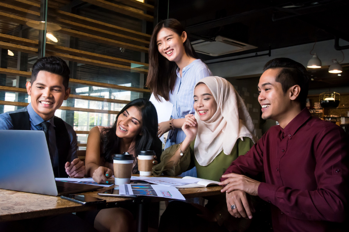 Multi-ethnic group of coworkers talking