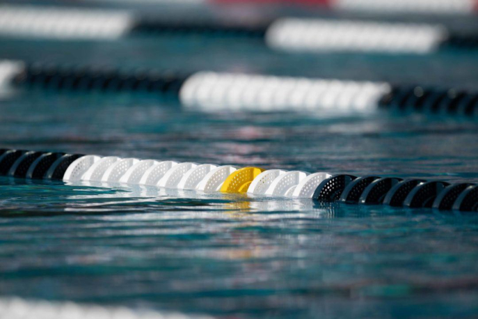 swimming pool closeup with black and white in-water barriers