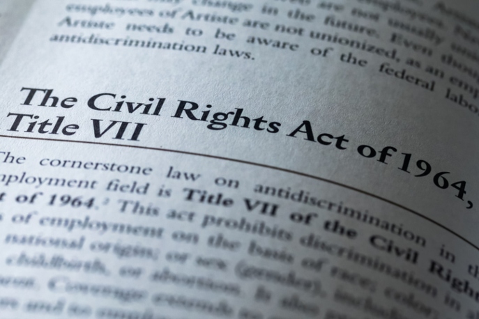 The Civil Rights Act of 1964 Title VII written in business textbook